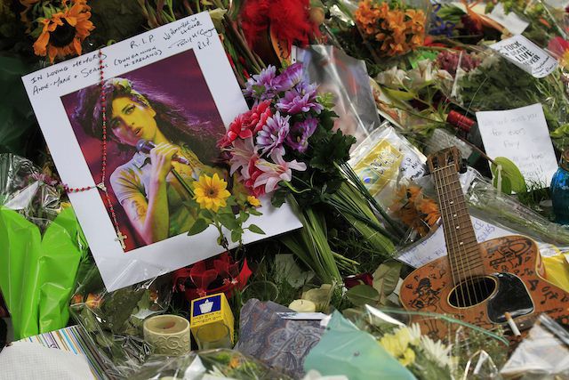The memorial site outside Amy Winehouse's apartment in London